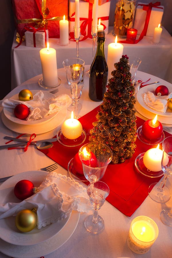 Many Gifts Near a Christmas Tree in the Candlelight Stock Photo - Image ...