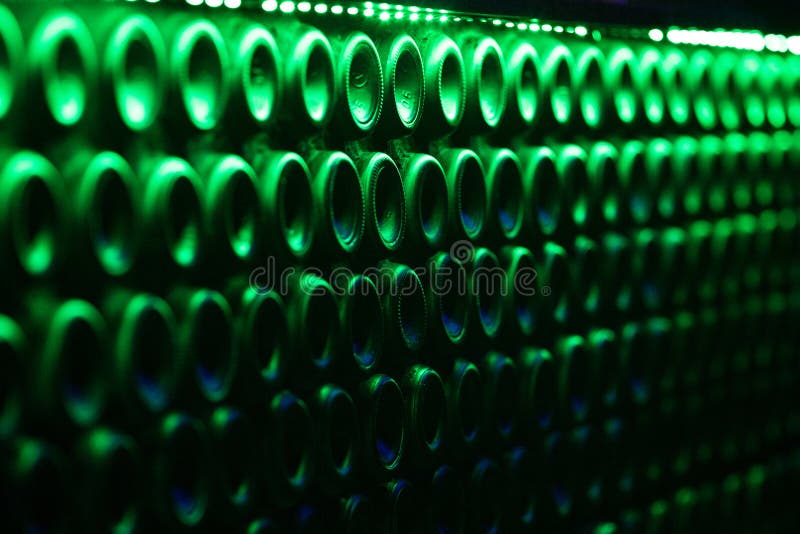 Many green wine bottles stock photo. Image of basement 83654112