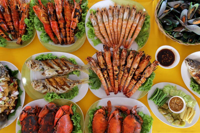 Many kind of sea food on dining table