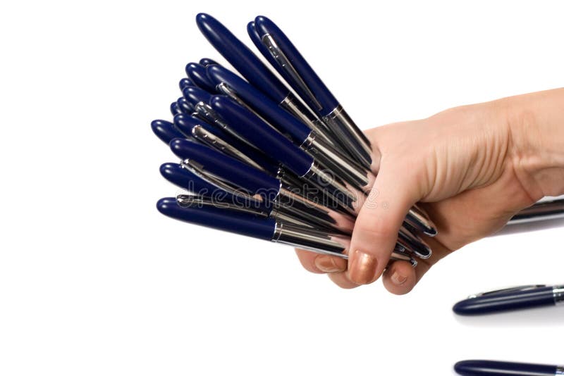 Many pens are in a hand