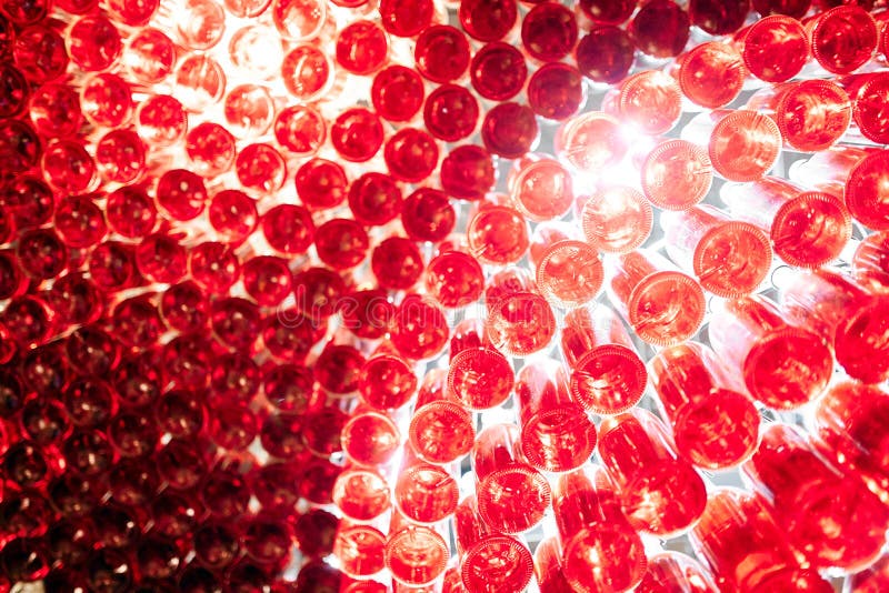 Many red empty bottles hanging from the ceiling in the restaurant royalty free stock photos Many red empty bottles hanging from the ceiling in the restaurant royalty free stock photos