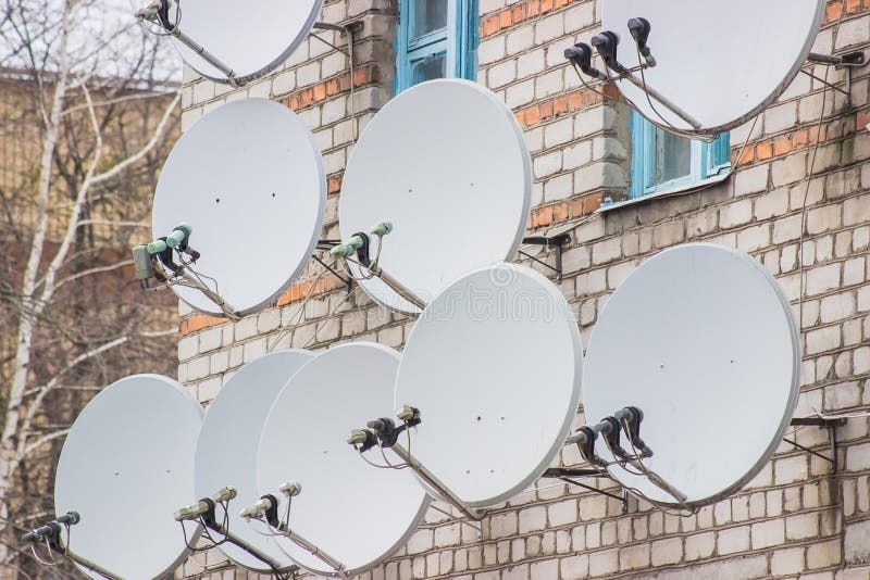 Many Satellite Dish Antennas on the House Stock Photo Image of head