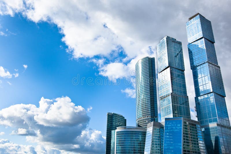 Many scyscrapers of Moscow city under blue sky