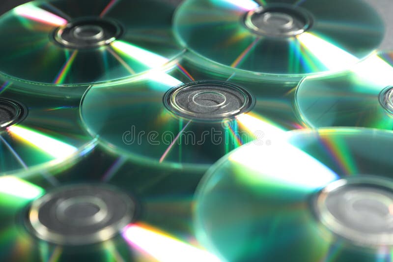 Many shiny compact discs as background, closeup royalty free stock photos