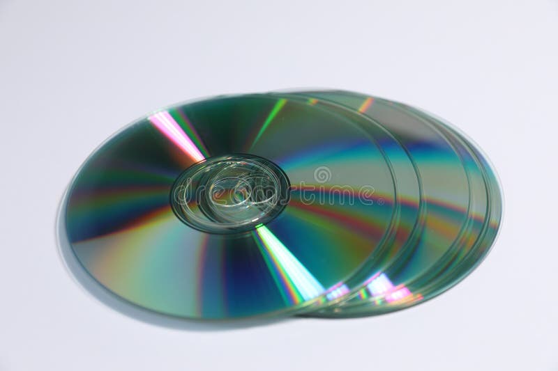 Many shiny compact discs on light background stock photo