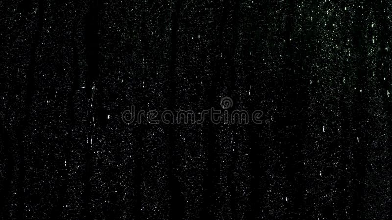 Many Small Drops on Black Glass Curface Coming Down on Black Background,  Window Condensation. Stock Footage. Close Up Stock Image - Image of  backdrop, colors: 146269717
