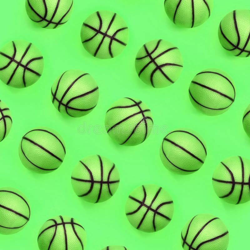 Many small green balls for basketball sport game lies on texture background stock image Many small green balls for basketball sport game lies on texture background stock image