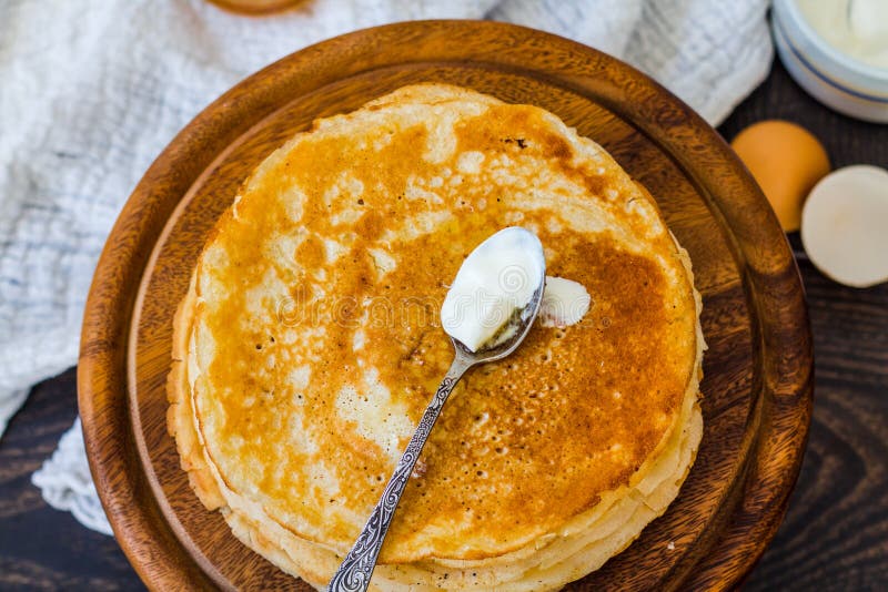 Many Thin Sweet Pancakes with Honey, Breakfast, Rustic Stock Photo