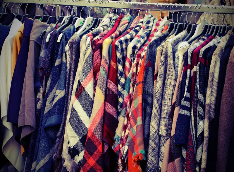 Many Used Clothes Hanging in the Flea Market Stall Stock Image - Image ...