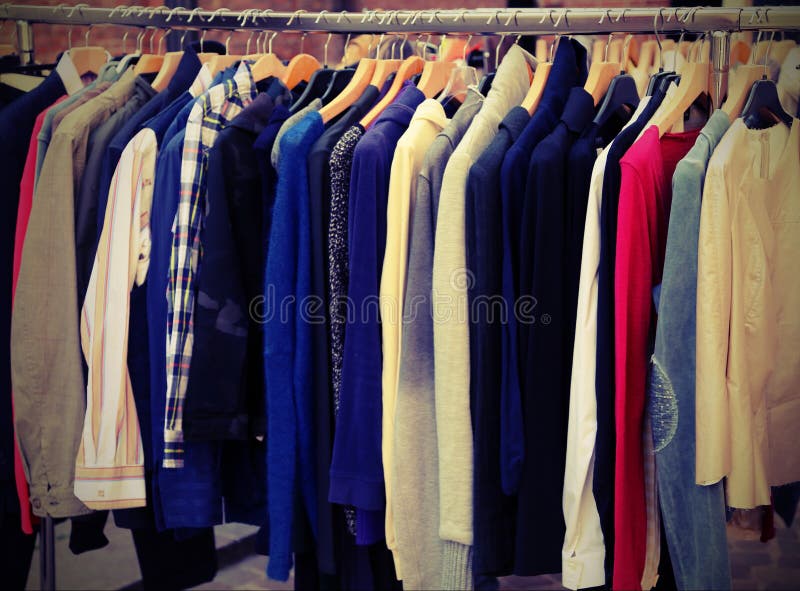 Many Vintage Clothes for Sale with Vintage Effect Stock Photo - Image