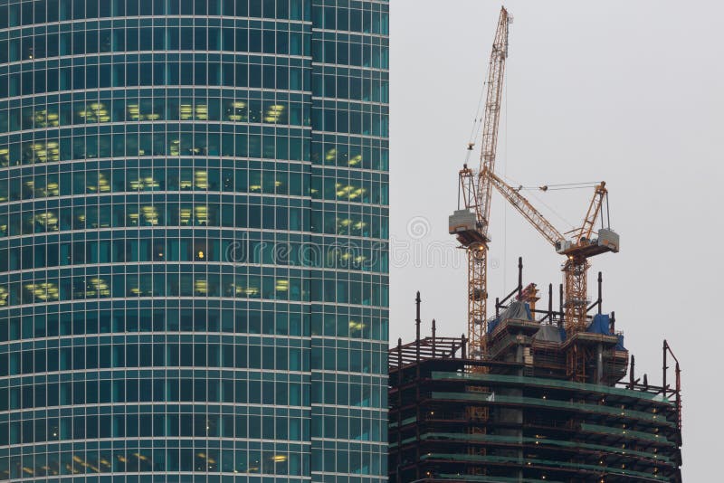 Many windows of skyscraper and construction
