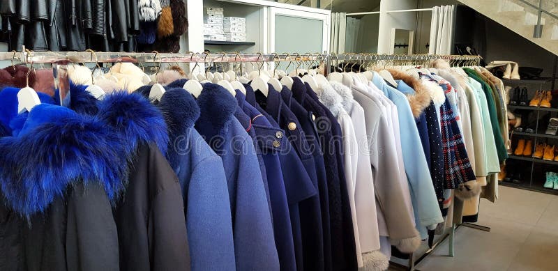 Many Winter Coats Hanging on Stainless Steel Hanger for Rent or ...