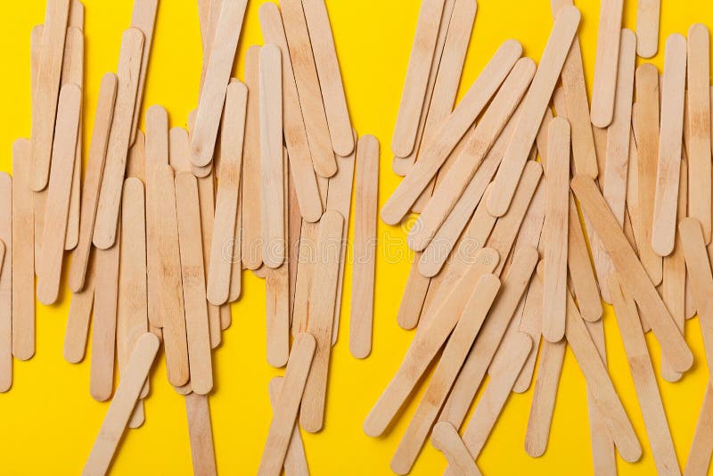 One and Many Wooden Ice Cream Sticks in Heap on White Background. Concept  Gray Crowd and Individual Stock Image - Image of abstract, sticks: 143370295