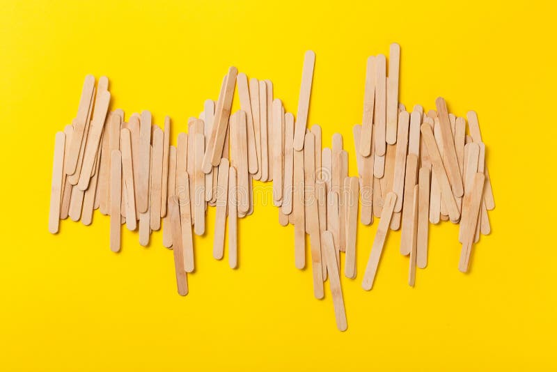 One and Many Wooden Ice Cream Sticks in Heap on White Background. Concept  Gray Crowd and Individual Stock Image - Image of abstract, sticks: 143370295