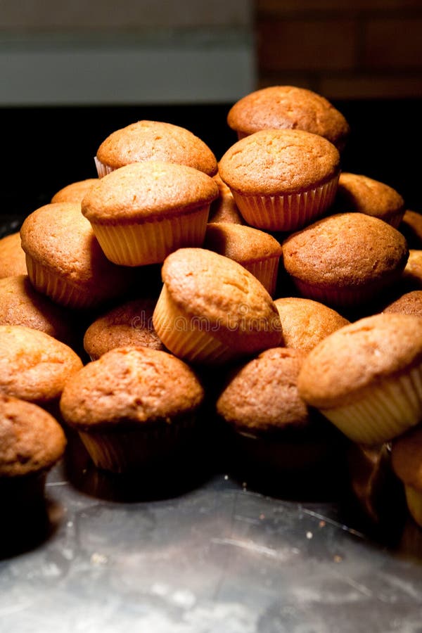 Many yellow cakes in cafe in morning