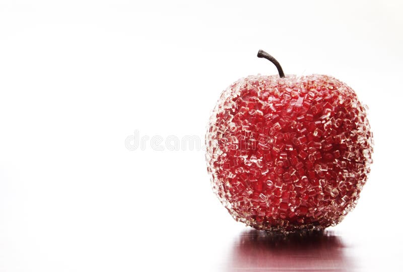 Frozen plastic red apple with reflection. Frozen plastic red apple with reflection