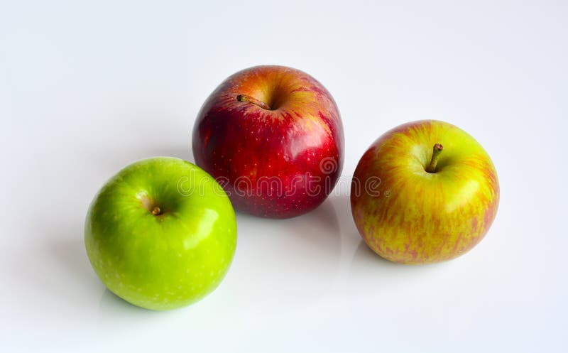 Colorful apples, red green and yellow fruit, isolated on white background. Health concept. Colorful apples, red green and yellow fruit, isolated on white background. Health concept.