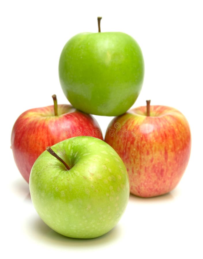 The ripe juicy apples on white. Isolation, shallow DOF. The ripe juicy apples on white. Isolation, shallow DOF.