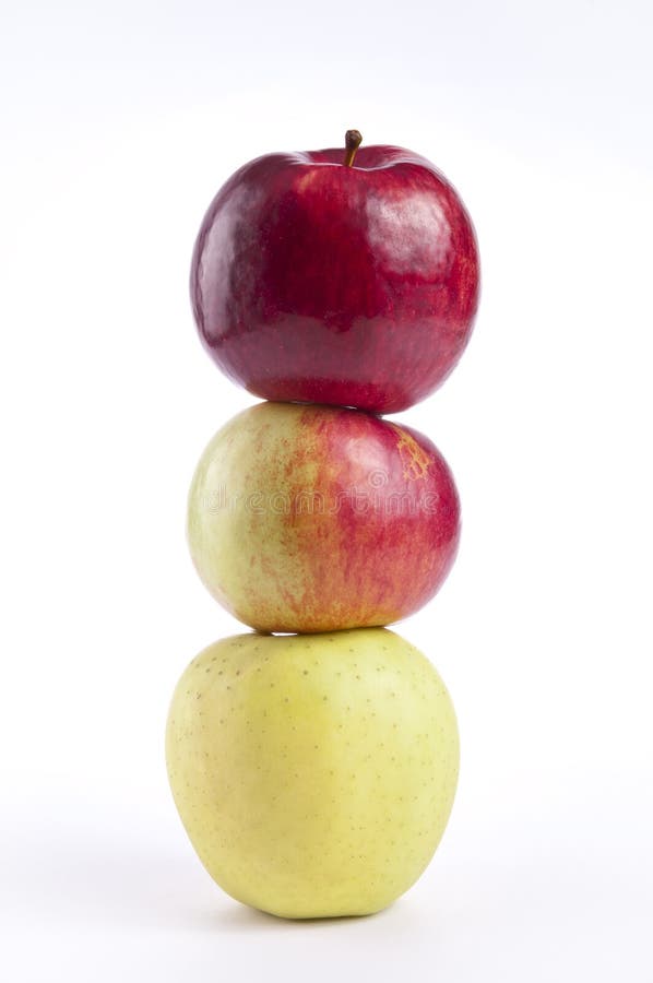 3 apples gradating in color - from yellow to red. 3 apples gradating in color - from yellow to red