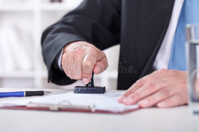 Man’s hand with stamp royalty free stock images