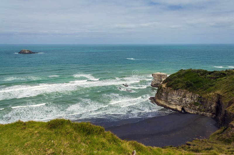 Maori Bay - playa Auckland Nueva Zelanda de Muriwai fotografía de archivo Maori Bay - playa Auckland Nueva Zelanda de Muriwai fotografía de archivo