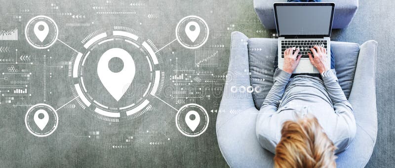 Map pin concept with man using a laptop stock photography Map pin concept with man using a laptop stock photography