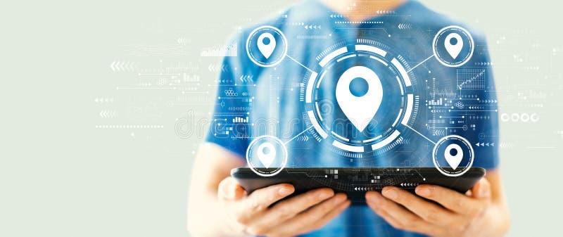 Map pin concept with man using a tablet royalty free stock photo