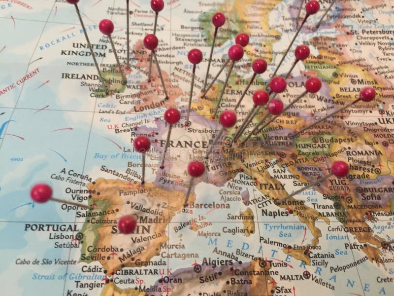 Red pins in a classic map of Europe. Red pins in a classic map of Europe