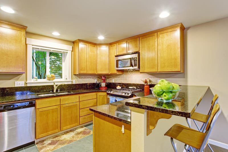 Maple Kitchen Cabinet With Black Granite Tops Stock Image ... Maple Kitchen Cabinet With Black Granite Tops Stock Image ... on Maple Cabinets Black Countertops
id=29789
