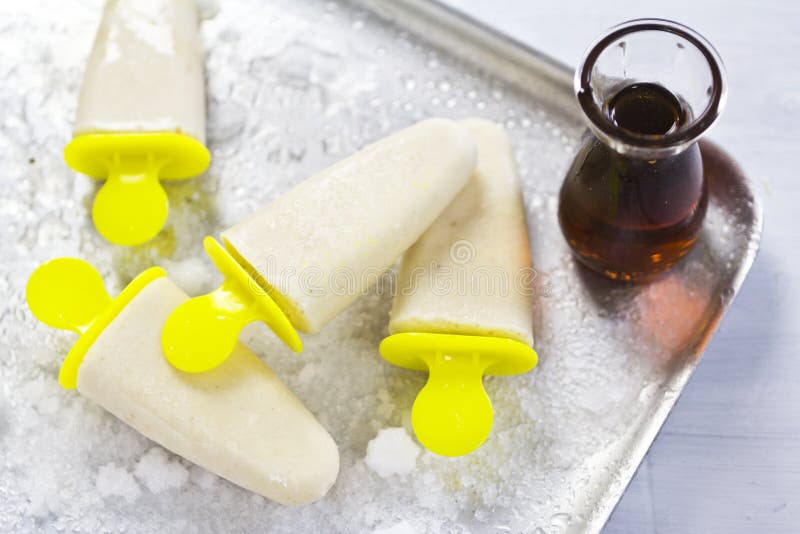 Vanilla maple syrup popsicle on tray