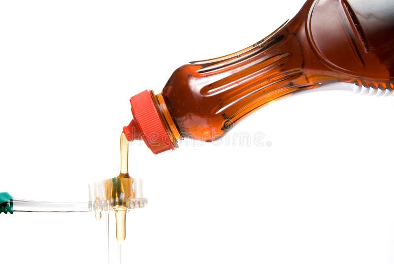 Maple Syrup Pouring Over a Tooth Brush Stock Image Image of medicine