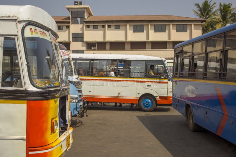 Indian People in the white bus at the bus station among other multi-colored buses, modern royalty free stock photo Indian People in the white bus at the bus station among other multi-colored buses, modern royalty free stock photo