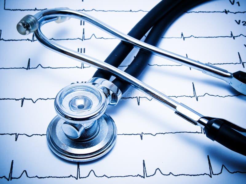 Stethoscope and ECG chart. Blue tint. Stethoscope and ECG chart. Blue tint.