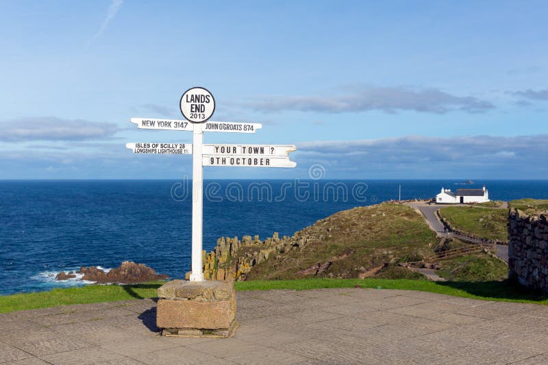 Signpost at Lands End Cornwall the most westerly point of England on the Penwith peninsula eight miles from Penzance. Signpost at Lands End Cornwall the most westerly point of England on the Penwith peninsula eight miles from Penzance