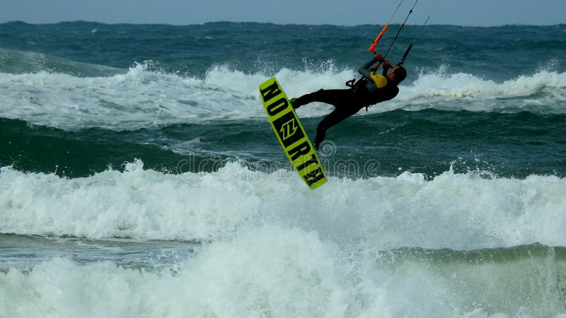 Mediterranean Sea. Israel. The coast near Haifa. The sea is storming. But there are daredevils who fly through the waves. Using a sail. Mediterranean Sea. Israel. The coast near Haifa. The sea is storming. But there are daredevils who fly through the waves. Using a sail.