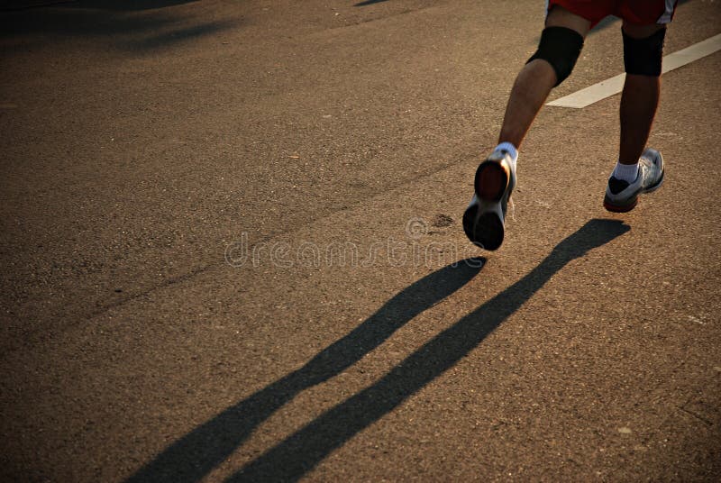 Leg Details of a Marathon Runner. Determined jogger stock images, royalty-free photos and pictures