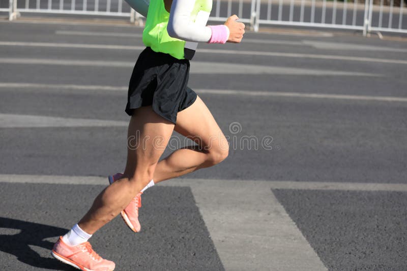 Marathon Runner Legs Running on City Stock Photo - Image of colorful ...