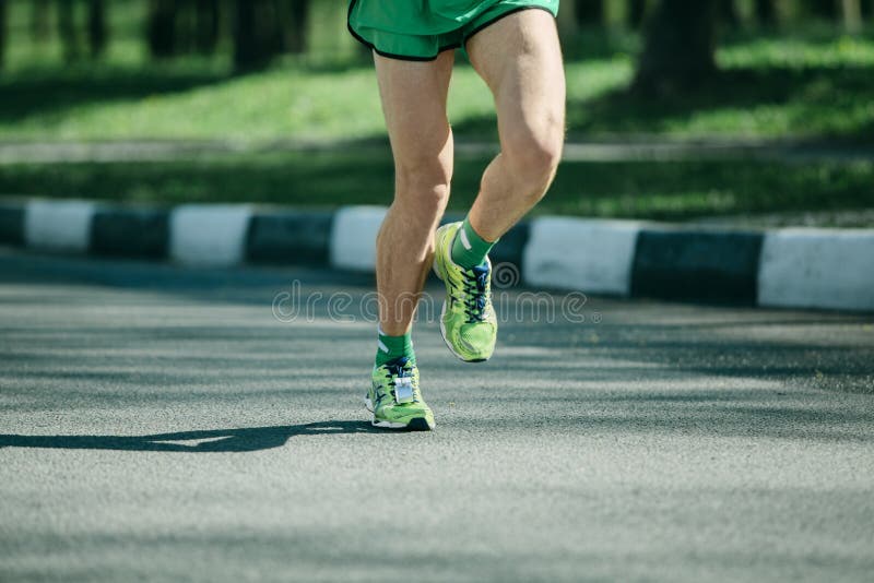 Marathon Runner Legs and Running Sneakers of Man Jogging Outdoor Stock ...