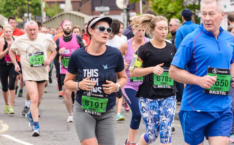 Marathon Runners X81. England, Bristol - May 7, 2017: Marathon Runners X81, Simplyhealth Great Bristol 10k, Shallow Depth of Field stock image Marathon Runners X81. England, Bristol - May 7, 2017: Marathon Runners X81, Simplyhealth Great Bristol 10k, Shallow Depth of Field stock image