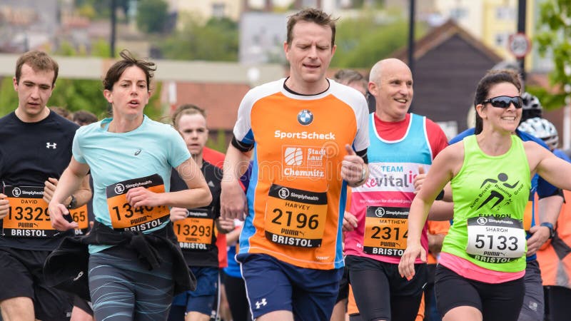 Marathon Runners W4. England, Bristol - May 7, 2017: Marathon Runners W4, Simplyhealth Great Bristol 10k, Shallow Depth of Field royalty free stock photos Marathon Runners W4. England, Bristol - May 7, 2017: Marathon Runners W4, Simplyhealth Great Bristol 10k, Shallow Depth of Field royalty free stock photos