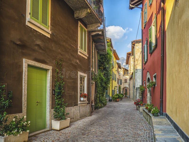 Wonderful glimpse of a colorful alley in the town of Mandello sul Lario, on Lake Como. Wonderful glimpse of a colorful alley in the town of Mandello sul Lario, on Lake Como