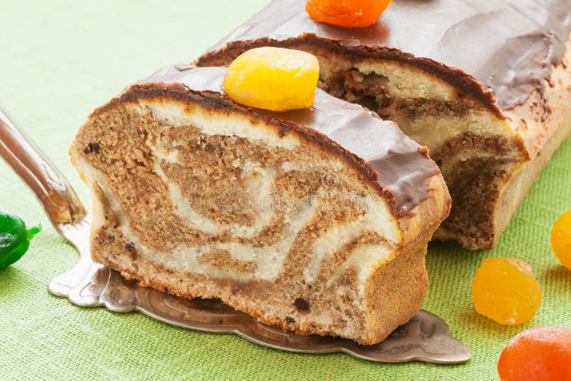 Marble Pound Cake with Chocolate Glaze and Caramelized Fruits Stock