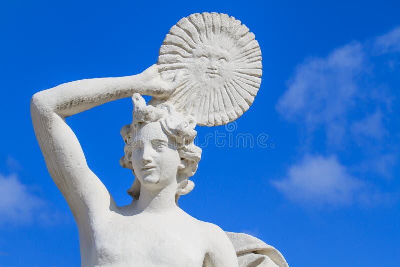 Marble statue with solar disk stock images