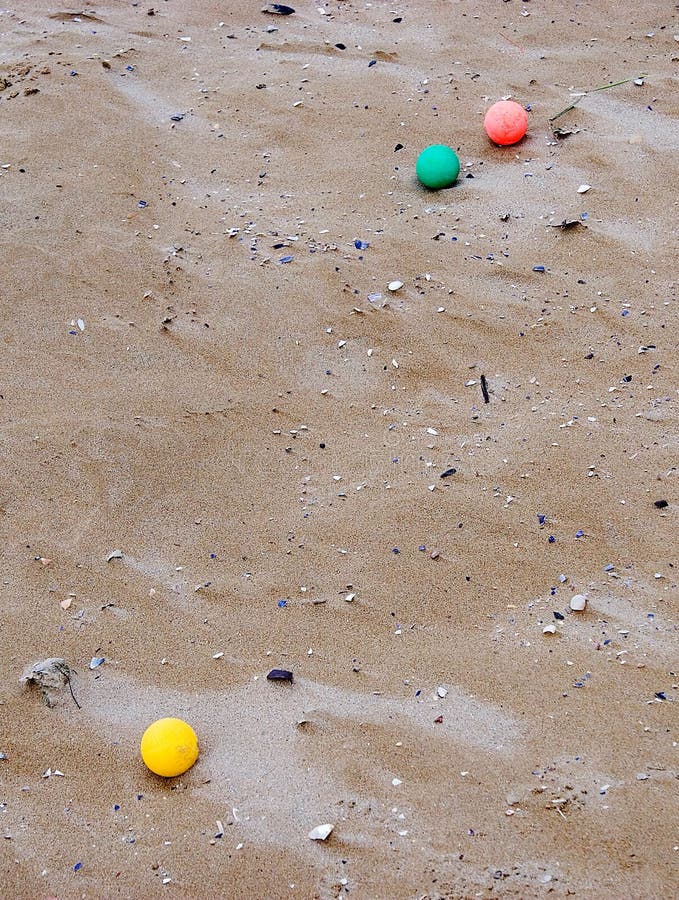 Marbles on the beach stock image. Image of yellow, autumn 79809129