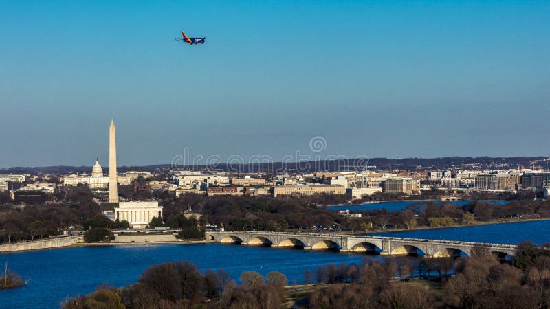 MARCH 26, 2018 - ARLINGTON, VA - WASH D.C. - Aerial view of Washington D.C. from Top of Town restaurant, Arlington, Virginia shows Lincoln & Washington Memorial and U.S. Capitol and Memorial Bridge crossing Potomac River. MARCH 26, 2018 - ARLINGTON, VA - WASH D.C. - Aerial view of Washington D.C. from Top of Town restaurant, Arlington, Virginia shows Lincoln & Washington Memorial and U.S. Capitol and Memorial Bridge crossing Potomac River