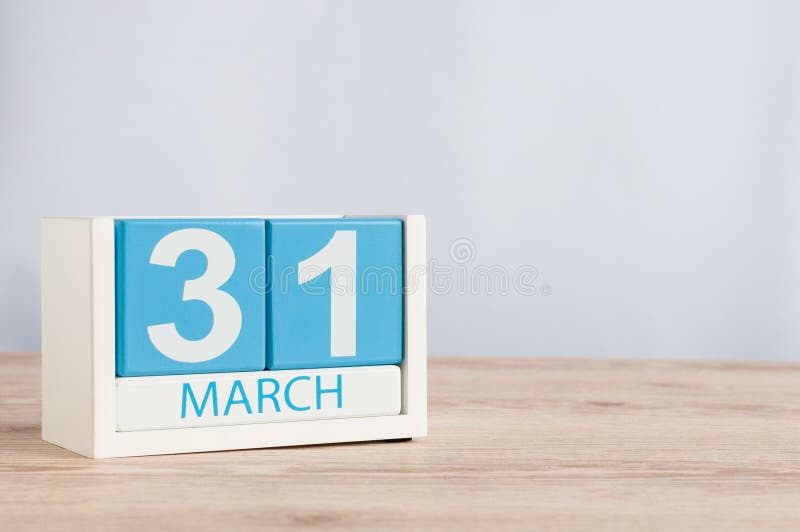 March 31st. Day 31 of month, wooden color calendar on table background. Spring time, empty space for text royalty free stock photo March 31st. Day 31 of month, wooden color calendar on table background. Spring time, empty space for text royalty free stock photo