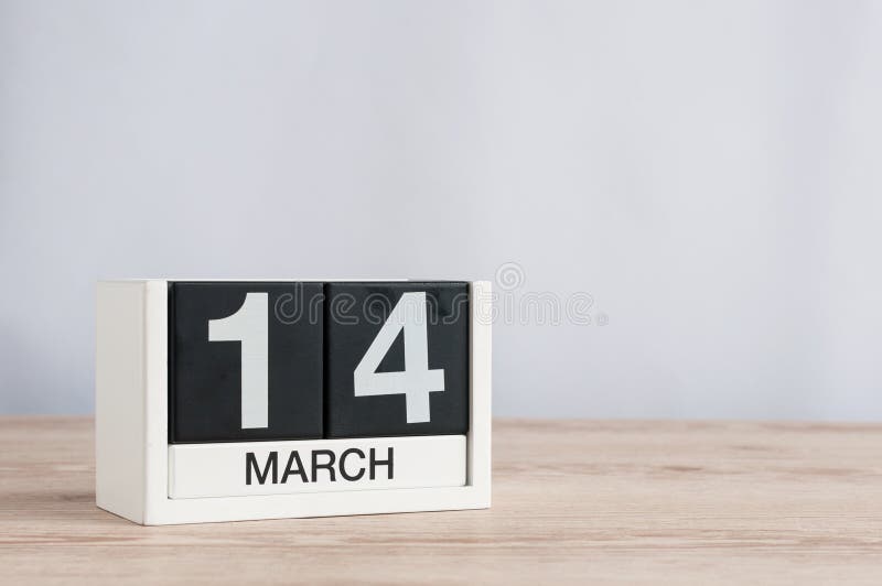 March 14th. Day 14 of month, wooden calendar on light background. Spring time. Commonwealth and International pi days stock photo March 14th. Day 14 of month, wooden calendar on light background. Spring time. Commonwealth and International pi days stock photo