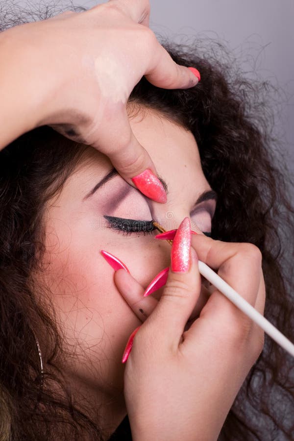 Make-up creation procedure for young woman. Make-up creation procedure for young woman