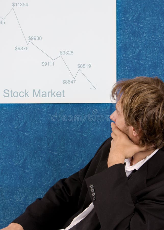 Stock broker analyzing stock chart. Stock broker analyzing stock chart