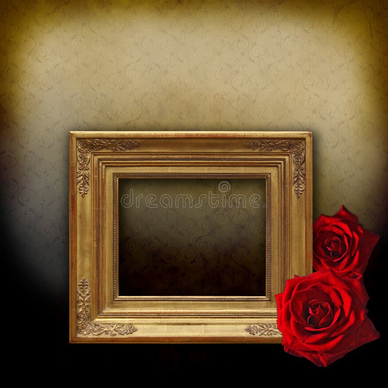 A baroque golden frame with two red roses on a vintage background. A baroque golden frame with two red roses on a vintage background